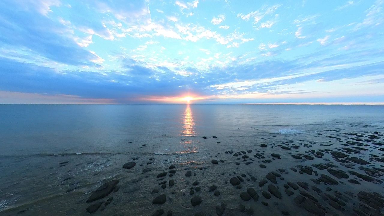 Insta360 Sphere video grab. Image take on the beach at sunset.