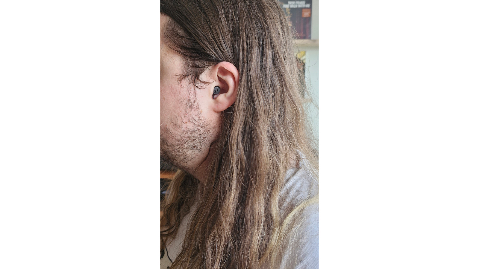 Sennheiser SoundProtex Plus in a man's ear