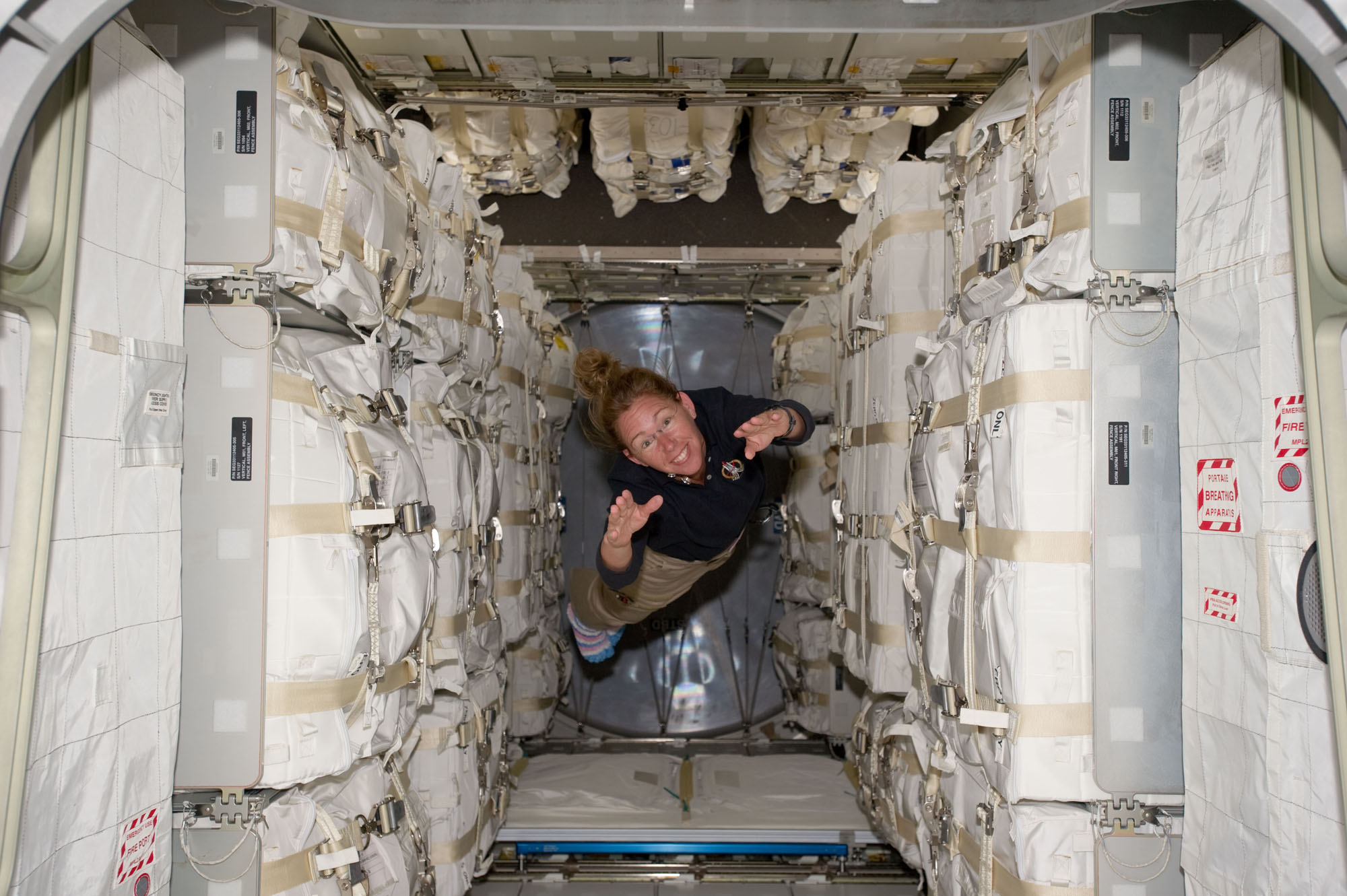 Astronaut Sandy Magnus and space station supplies