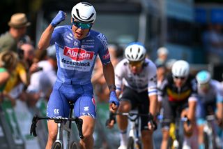 AALTER BELGIUM AUGUST 31 Jasper Philipsen of Belgium and Team Alpecin Deceuninck celebrates at finish line as stage winner during the 20th Renewi Tour 2024 Stage 4 a 1785km stage from Oostburg to Aalter UCIWT on August 31 2024 in Aalter Belgium Photo by Luc ClaessenGetty Images