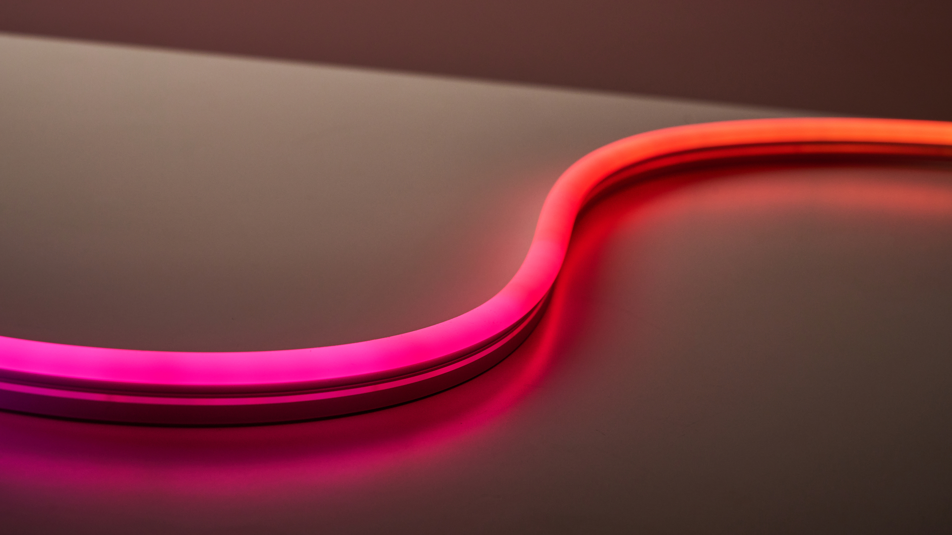 The rope light is colored pink and orange.