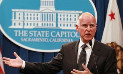 "It's better to take our medicine now," Jerry Brown told reporters in regards to borrowing money to help the state's $25 billion deficit.