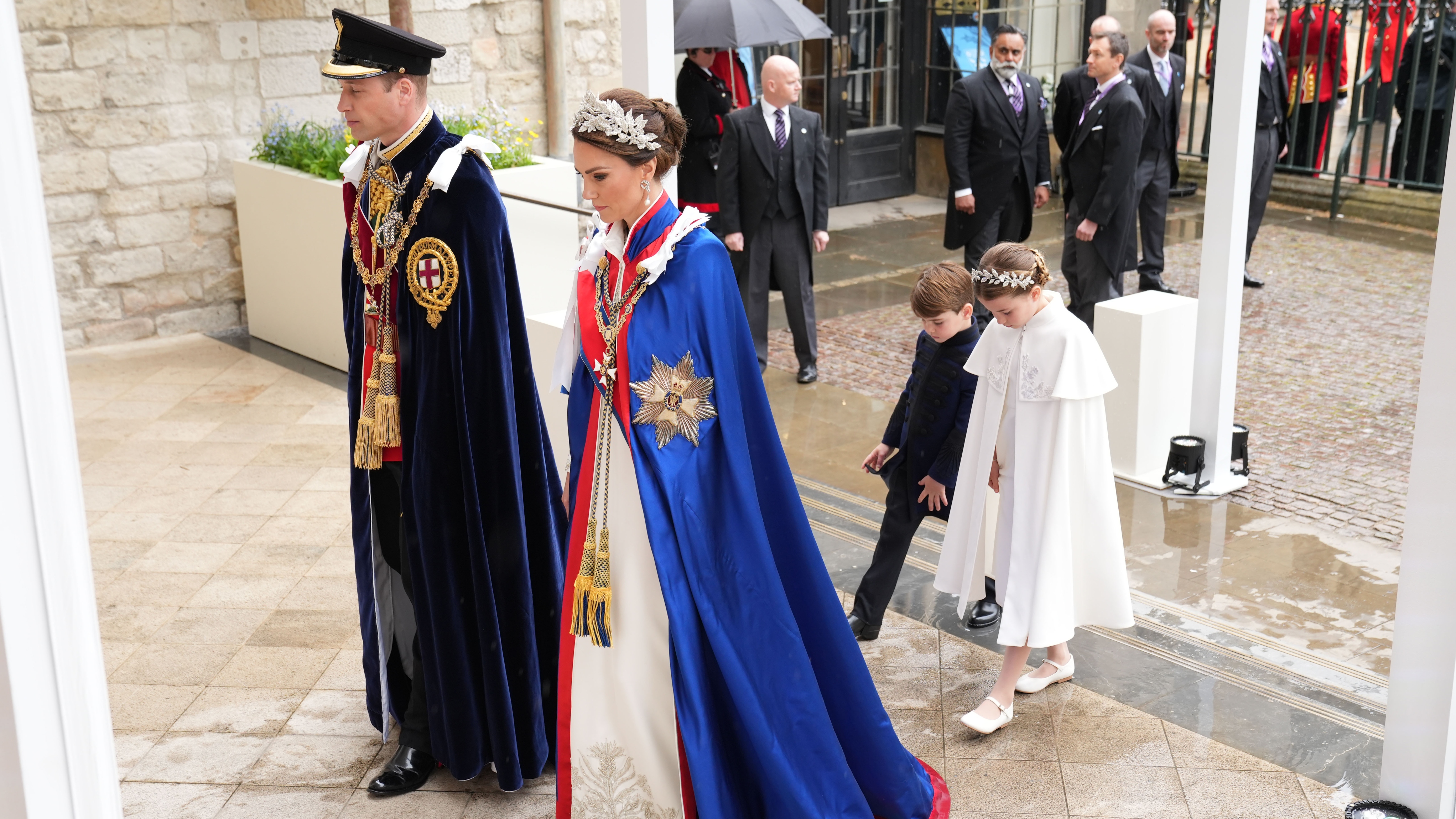 Prince William, Prince of Wales and Catherine, Princess of Wales,with Prince Louis and Princess Charlotte, arrive for the coronation
