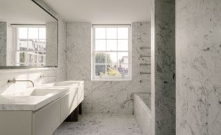 Its crisp interiors feature luxurious Carrara marble