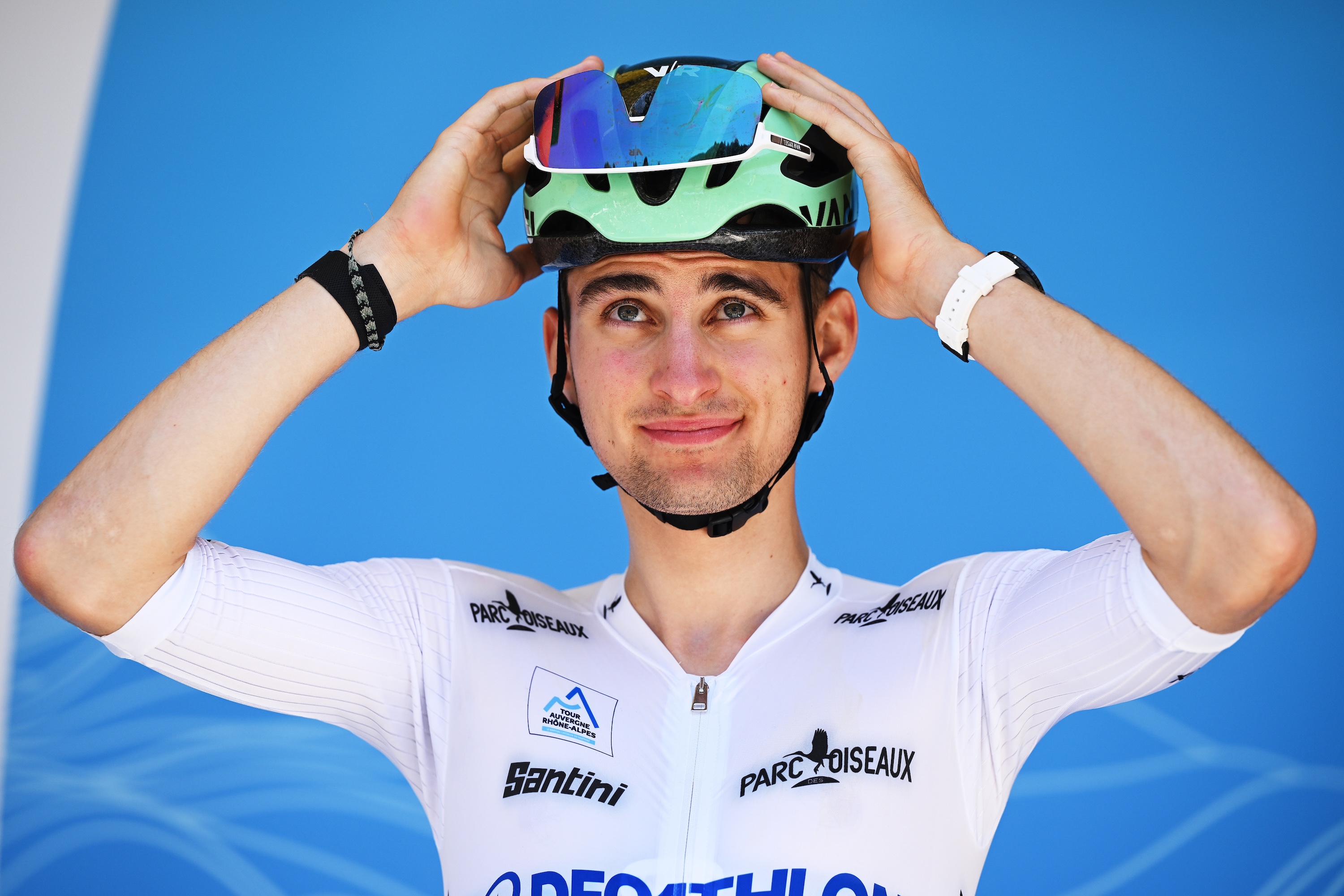 Paul Seixas adjusts his helmet