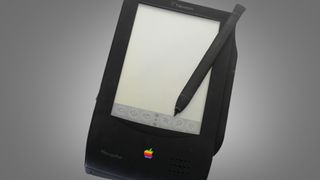 The Apple Newton Messagepad 100 on a grey background