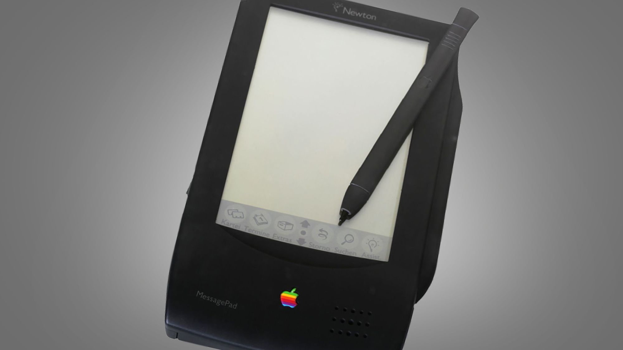 The Apple Newton Messagepad 100 на сером фоне