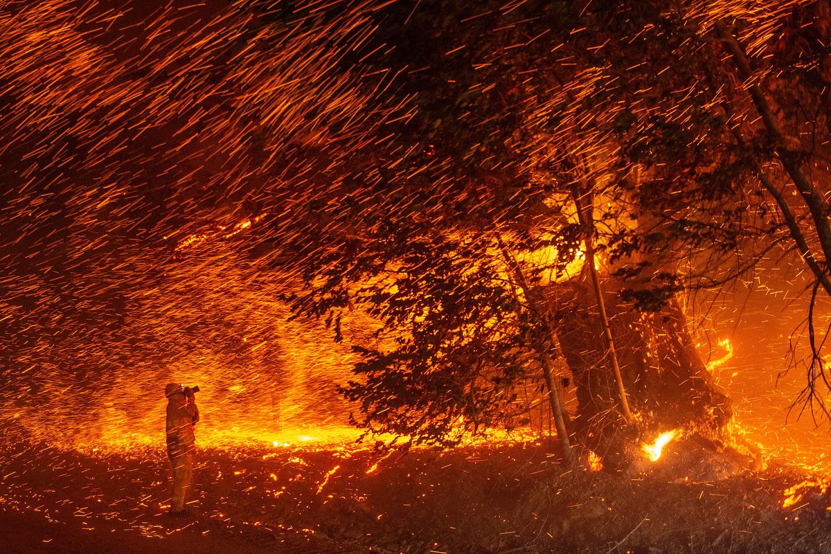 Wind and flames rip through an area near Geyserville, California, during the Kincade Fire on Oct. 24, 2019. 