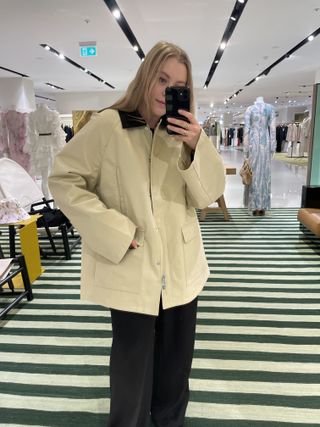 Woman wears cotton country jacket by Toteme