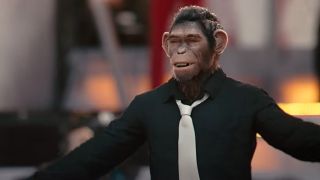 Robbie Williams, as a chimp in a suit on stage in Better Man