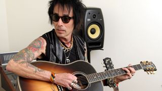 Earl Slick attends Art and Music Of The Beatles at Gibson Guitar Entertainment Relations Showroom on January 22, 2014 in Beverly Hills, California.
