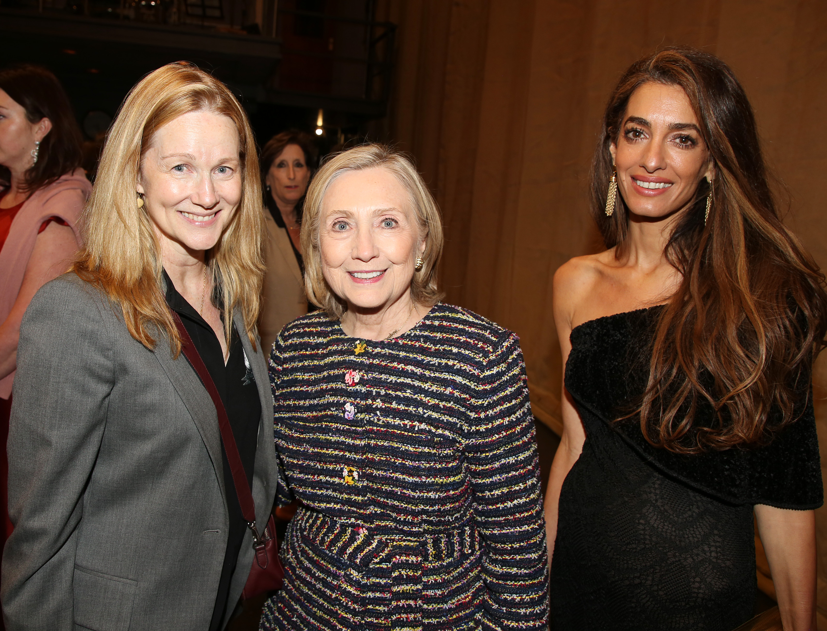 Amal and George Clooney pose with Laura Linney and Hillary Clinton backstage at Broadway show Good Night and Good Luck