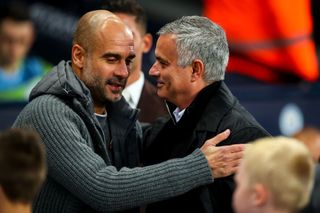 Pep Guardiola the head coach / manager of Manchester City and Jose Mourinho the head coach / manager of Manchester United during the Premier League match between Manchester City and Manchester United at Etihad Stadium on November 11, 2018 in Manchester, United Kingdom. (Photo by Robbie Jay Barratt - AMA/Getty Images)