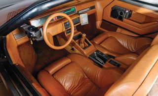 Brown colored leather seat.