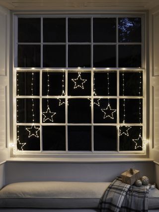 Osby star Christmas window light display decoration