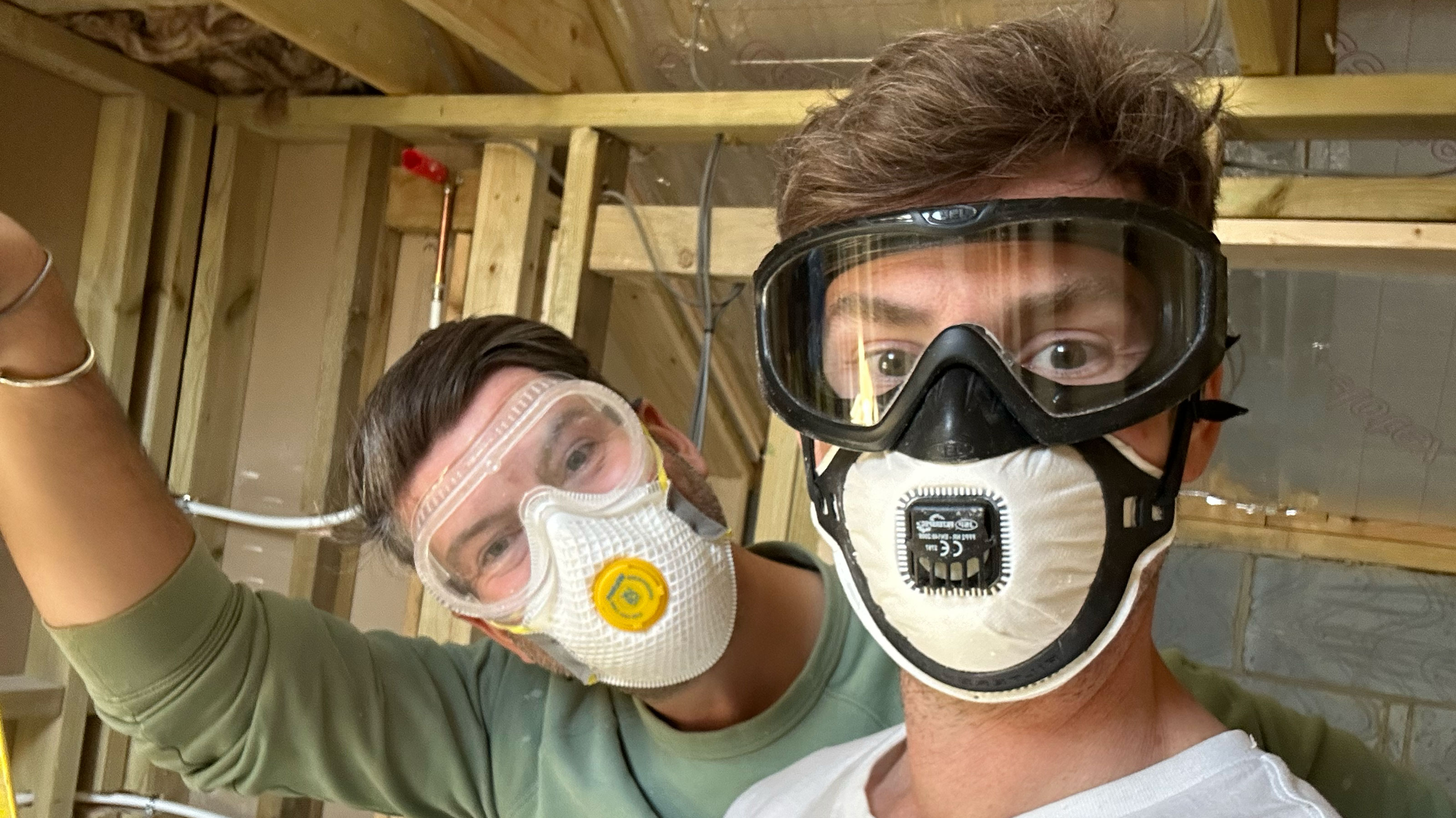 Two men in face masks and googles for DIY