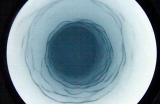 This deep section of the borehole drilled into Antarctica’s subglacial Lake Whillans is about 0.5 meters (20 inches) in diameter and shows corrugations due to turbulence during melting.