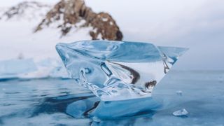 Transparent ice block on Lake Baikal on Olkhon island, Siberia, Russia, winter 2018.