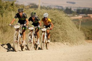 David George and Kevin Evans set the pace on Stage 3 as race leader, Burry Stander, sits in.