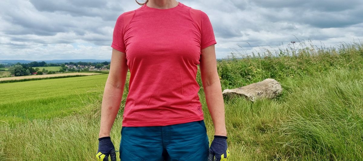 Endura Women&#039;s SingleTrack S/S jersey being worn by a rider in a field