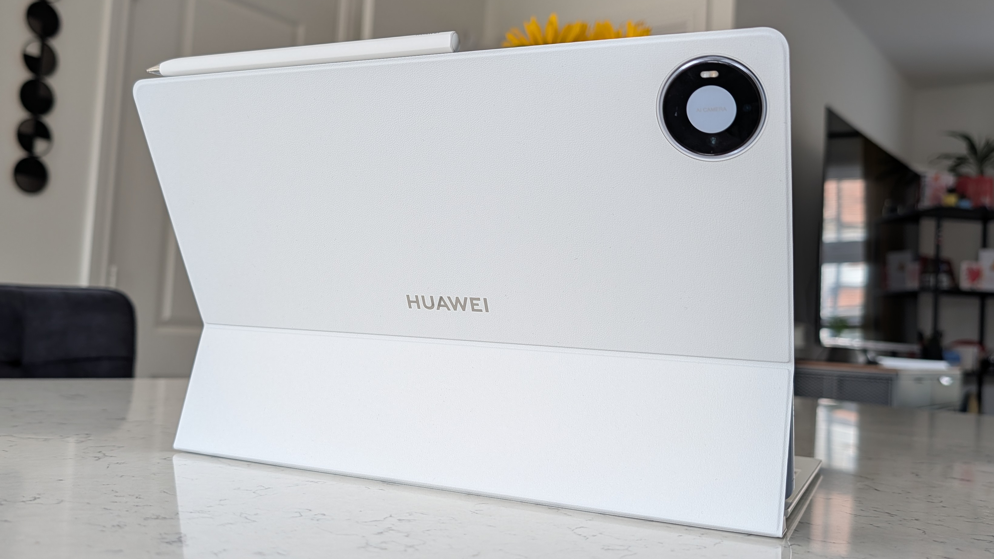 Photos of the Huawei MatePad Pro Max resting on a marble table