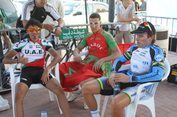 Yousef Mirza Banihammad (3rd, UAE), Mouhcine Lahsaini (1st, Morocco) and Malcolm Lange (2nd, Team Medscheme) await the presentation