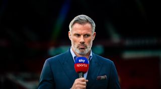 Jamie Carragher broadcasts ahead of the Premier League match between Manchester United and Liverpool FC at Old Trafford on August 22, 2022 in Manchester, England.