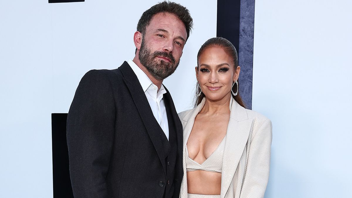 Ben Affleck and Jennifer Lopez at The Mother premiere smiling.