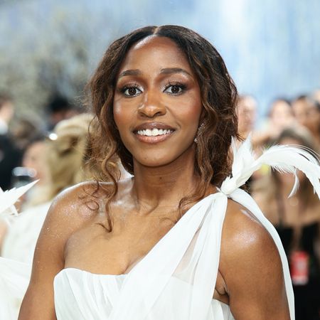 ayo edebiri attends the 2026 met gala wearing honey brown hair and a white gown