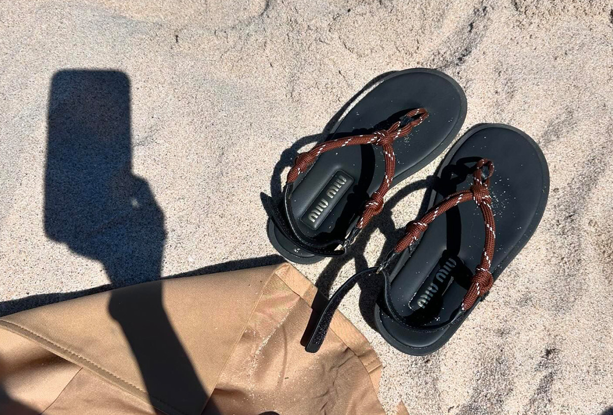 A pair of burgundy Miu Miu rope sandals.