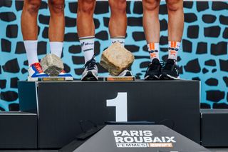Riders at the finish of Paris-Roubaix 2024