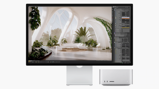 A photo of a Mac display showing a design program, with the comparatively small Mac Studio underneath and in front of the monitor against a white background.