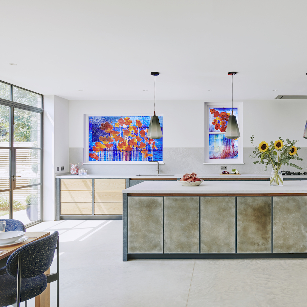 kitchen room with kitchen countertops and flower in vase