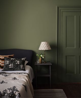 Green walls, blue bed head