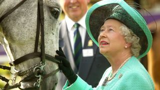 Queen Elizabeth II attends the third day of the Royal Windsor Horse Show at Home Park on May 15, 2004 in Windsor, England.