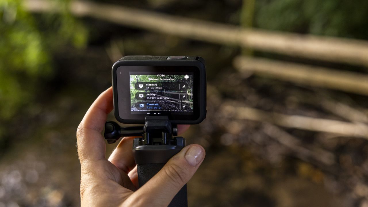 A GoPro Hero 10 Black on a floaty handler