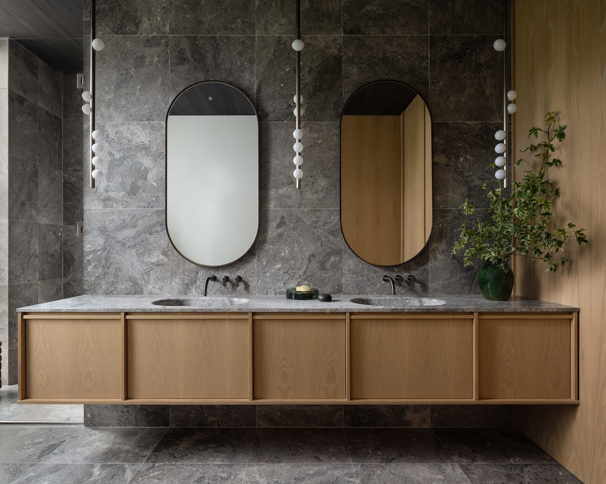 gray bathroom with double vanity