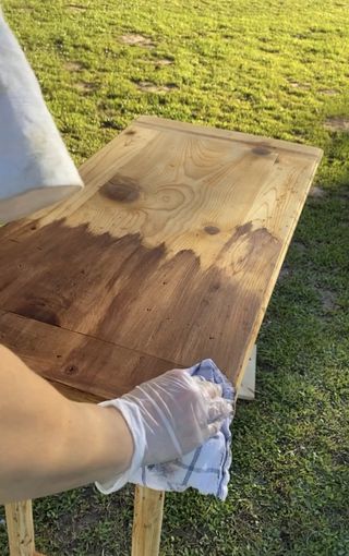 staining a wooden piece of furniture