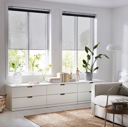 room with white wall wooden floor and sheer smart blinds