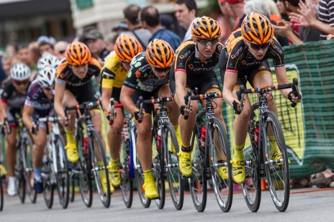 Optum sets up the lead-out with one lap to go.
