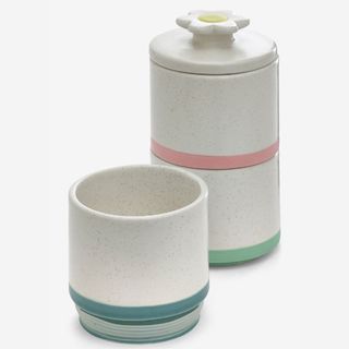 Stackable tea and coffee pots with daisy on top 