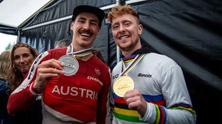 Charlie Hatton and Andi Kolb with UCI medals