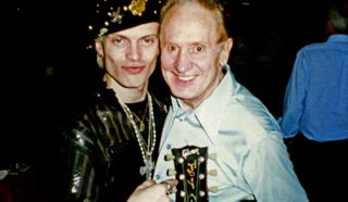 Billy Idol and Les Paul at Fat Tuesday's in New York City, 1986. Les is holding Idol's Les Paul Junior guitar, which he signed for him when they met. PHOTO MAY NOT BE USED OUTSIDE OF THIS ARTICLE