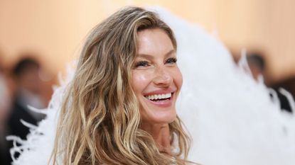 Gisele Bündchen on a neautral background at the met gala