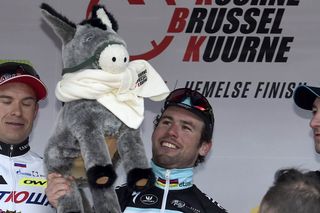 Mark Cavendish on the podium after winning the 2015 Kuurne-Brussels-Kuurne
