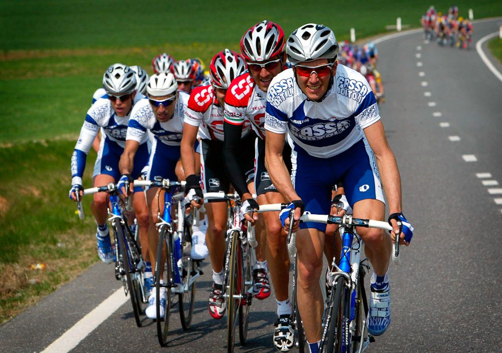 Ivan Basso (Fassa Bortolo), Andrea Peron (Team CSC) and Carlos Sastre (Team CSC).