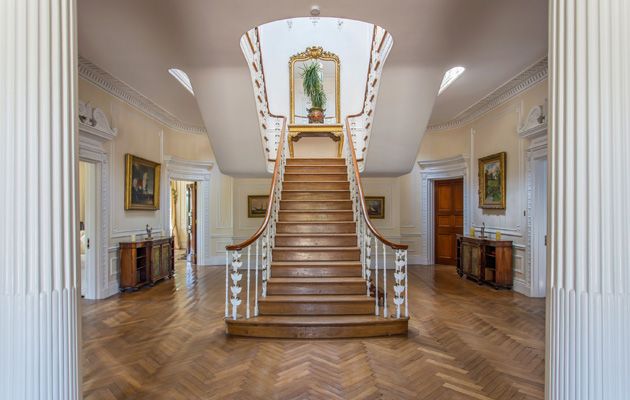 country homes with impressive staircases