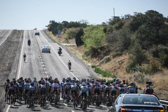 Riders try to get off the front as the race rolls out of town