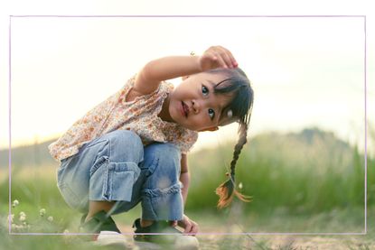 Child exploring outside