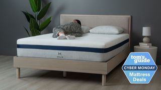 A woman sleeping on the Helix Midnight mattress